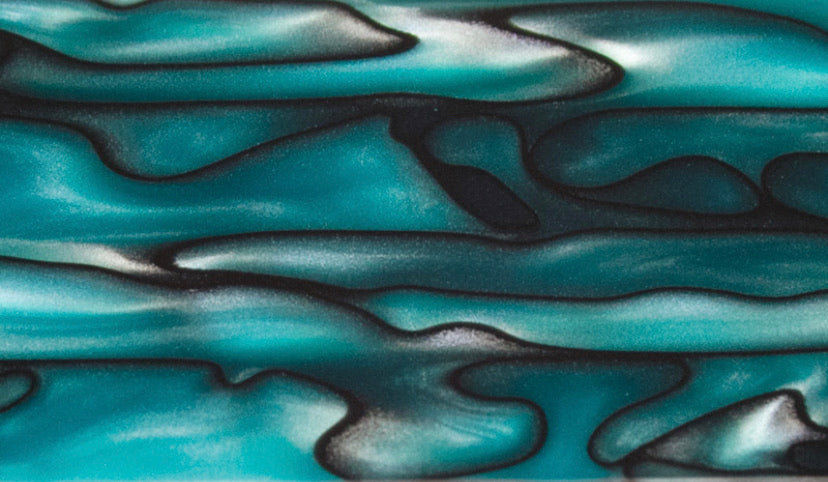 Grips in “ elfin eyes” pearl teal