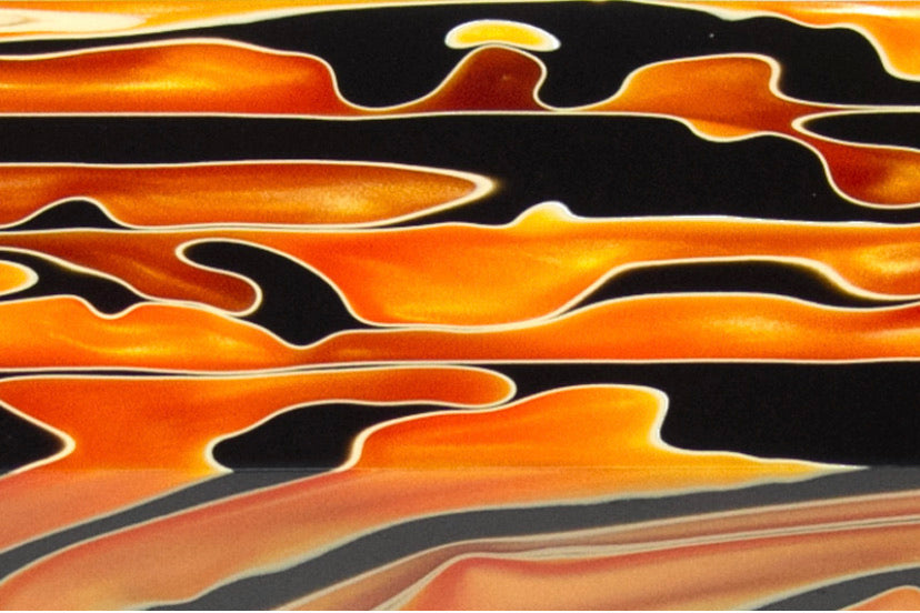 Grips in “Halloweenie” black and orange pearl